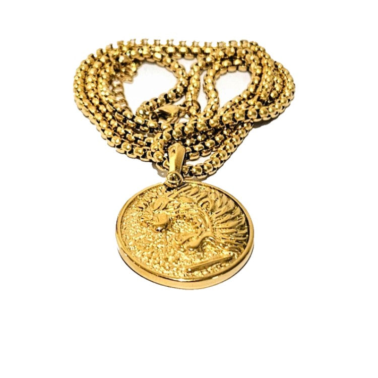 Gold pendant of the Nemean Lion from Greek mythology on a beaded necklace, featuring detailed lion imagery and ancient design elements.