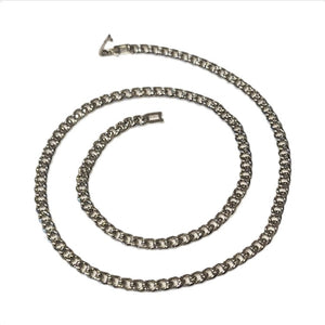 Men’s 5mm stainless steel curb chain necklace by T.M.J, showing the textured links and 50cm length on a white background.