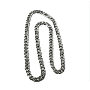 Men’s 7mm hypoallergenic stainless steel curb chain necklace by T.M.J, displayed on a neutral background.