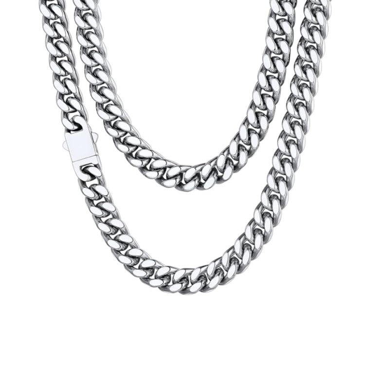 Stainless steel 12mm Cuban curb link chain necklace by T.M.J, showing the shiny, thick curb links on a white background.