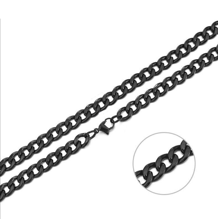 Stainless steel black IP plated 7mm curb link chain necklace by T.M.J, showcasing a sleek, durable jewelry piece with bold links.