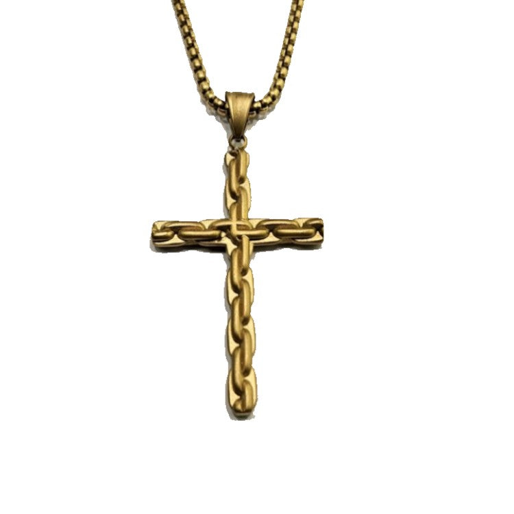 T.M.J Thornbury stainless steel cross with gold PVD satin finish, detailed religious jewelry pendant, close-up view.
