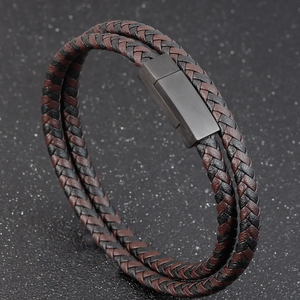 Men’s leather bracelet by T.M.J with black and brown woven pattern, 19cm, stylish accessory for men.