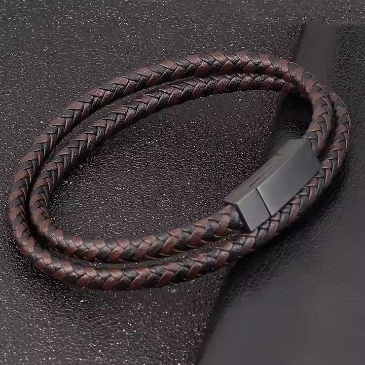 Men’s leather bracelet by T.M.J with black and brown woven pattern, 19cm, stylish men's leather bracelet accessory.