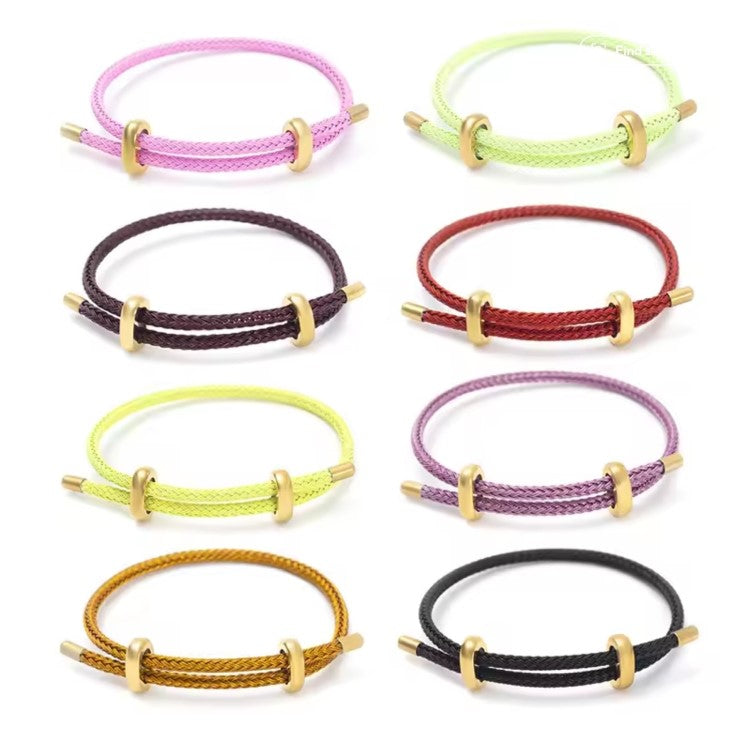 Genuine 4mm braided stainless steel leather bracelet with gold-tone accents by T.M.J, featuring a stylish and durable design.