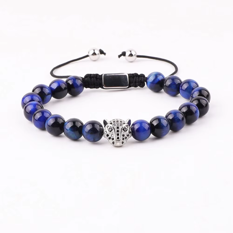 High-quality macrame bracelet with 8mm natural stone beads, CZ panther charm, and green tiger eye accents by T.M.J.