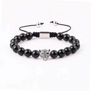High-quality 8mm natural stone beaded macrame bracelet with CZ panther charm and green tiger eye accents by T.M.J.