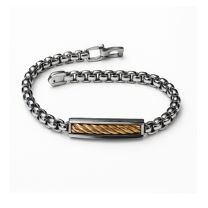 Stainless steel ID bracelet by T.M.J featuring a gold twisted wire insert, showcasing a sleek, modern metal bracelet design.