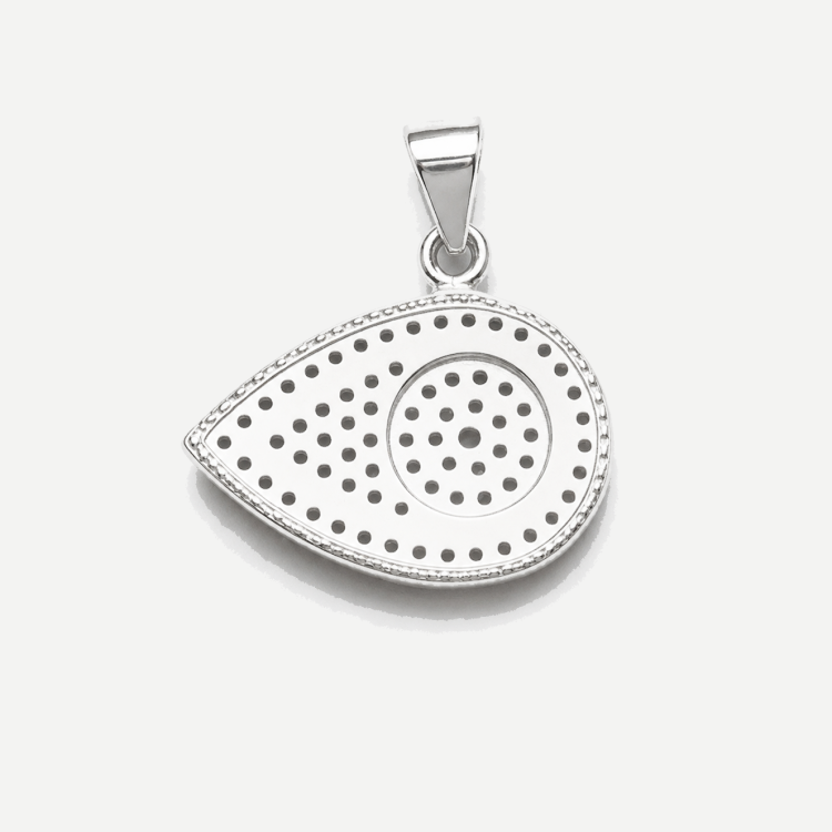 Sterling silver evil eye pendant featuring a blue azure guardian design, crafted by T.M.J. for protection and style.
