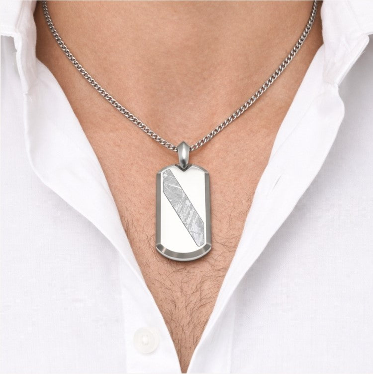 Gibeon meteorite and tungsten pendant by T.M.J, featuring a sleek, handcrafted jewelry pendant with meteorite and tungsten materials.