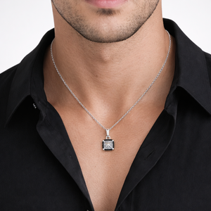 Sterling silver Astral Hex pendant with black cubic zirconia from T.M.J, featuring a detailed geometric design.