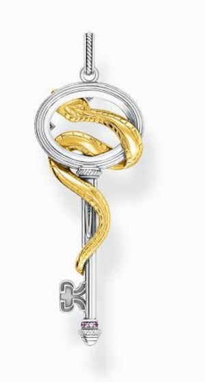 Silver and gold plated snake pendant with a key and crystal accents, featuring intricate design and shiny finish.