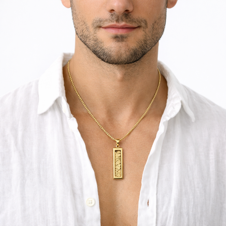 Stainless steel and gold geometric pendant by T.M.J, featuring a modern design with sleek metal finishes.