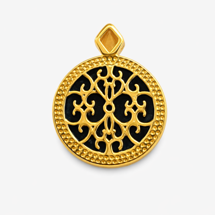 Sterling silver and gold pendant with lapis lazuli gemstone from T.M.J, featuring intricate design and vibrant blue stone.