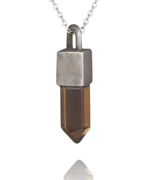 Stainless steel pendant with synthetic quartz crystal and chain, featuring a smoky quartz design by T.M.J.