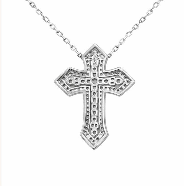 Sterling silver Duetta Dual Cross Pendant Necklace by T.M.J, featuring a religious design with two overlapping crosses.