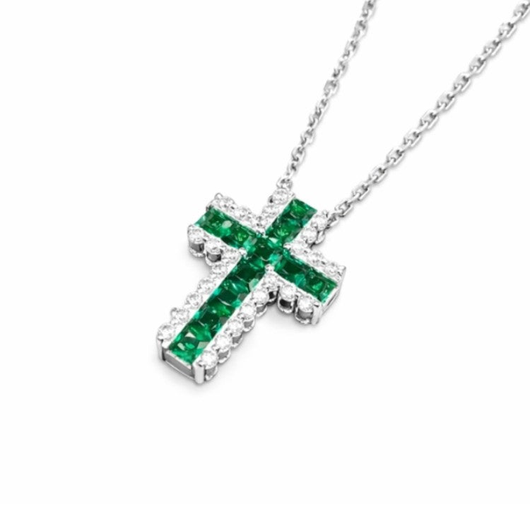 Green sterling silver cross necklace by T.M.J, religious jewelry featuring a detailed cross pendant on a sleek chain.