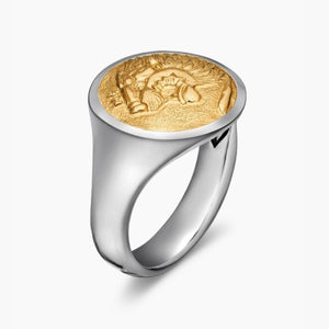 Sterling silver Nemean Lion signet ring with 18k gold accents by T.M.J, featuring detailed lion design on the band.