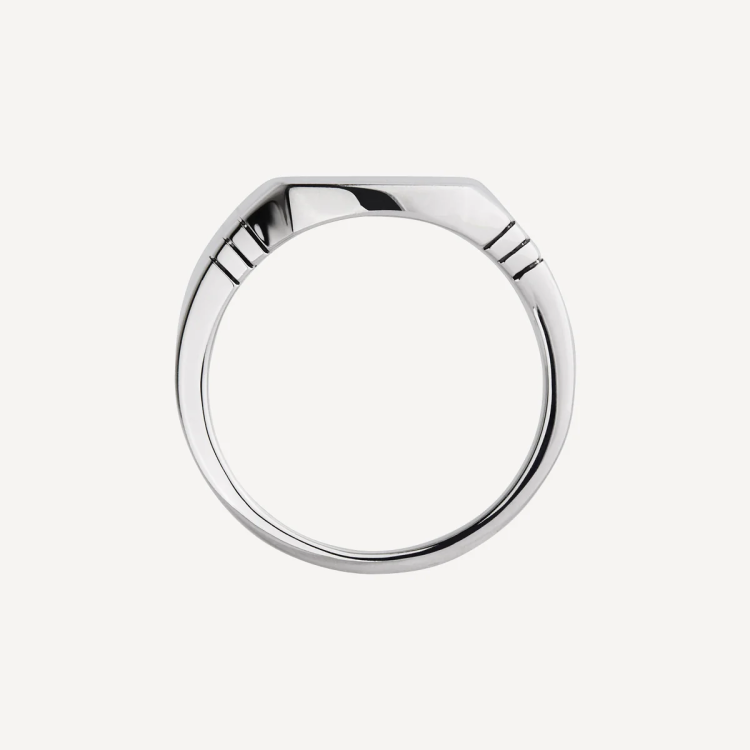 Men's sterling silver signet ring from T.M.J, featuring a smooth polished surface and classic design.
