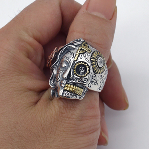 Sterling silver Sugar Skull Santa Muerte twin face ring, detailed skull design, crafted by T.M.J, perfect for unique jewelry style.