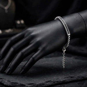 Cassiopeia steel bar bracelet by T.M.J with black CZ stones, stainless steel jewelry featuring sleek design and sparkling accents.