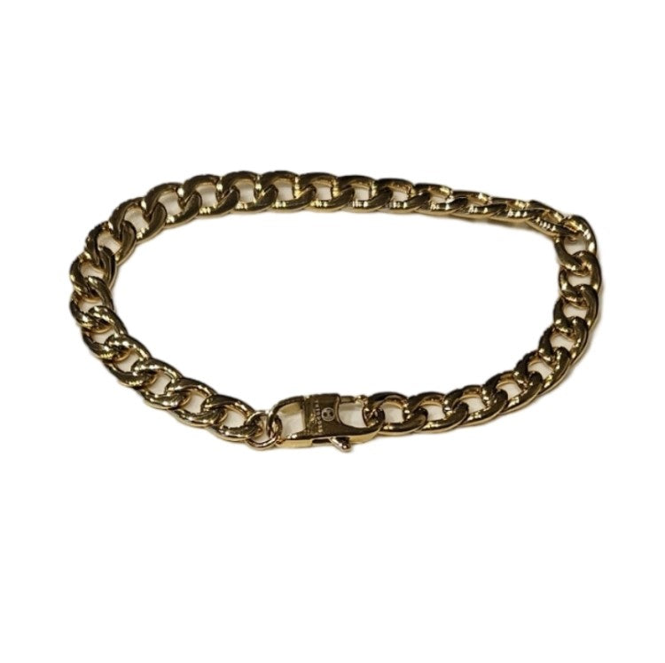 T.M.J stainless steel gold curb open link bracelet, 6.5mm width, 19.5 cm length, showcasing a sleek and polished design.