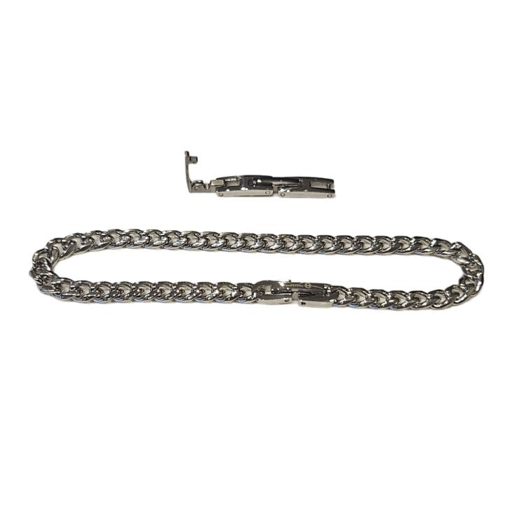 Stainless steel and gold-plated curb link bracelet, 5mm width, T.M.J brand, 19.5cm length, stylish jewelry accessory.