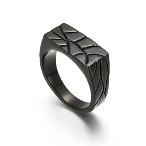 Men’s stainless steel ring with a crazy pattern finish, featuring a sleek silver design by T.M.J.