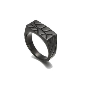 Men’s stainless steel ring with a crazy pattern finish by T.M.J, featuring a bold, intricate silver design.