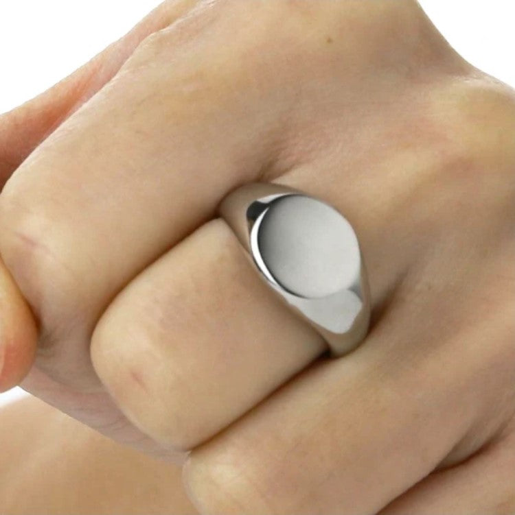 Stainless steel men's pinky ring by T.M.J featuring polished silver finish and bold edge design.