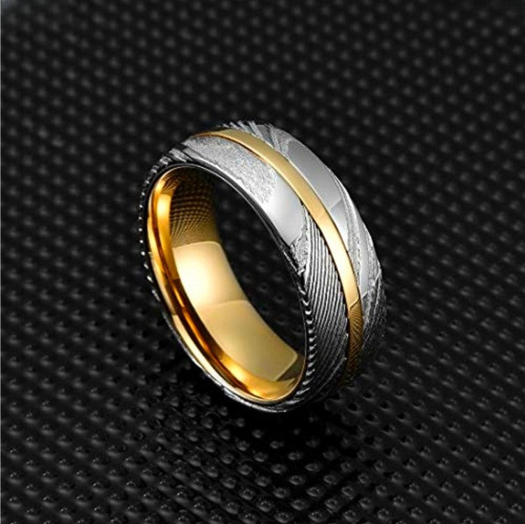 Helios 2 men's stainless steel ring with Damascus steel and gold inlay, featuring detailed craftsmanship and a sleek design.