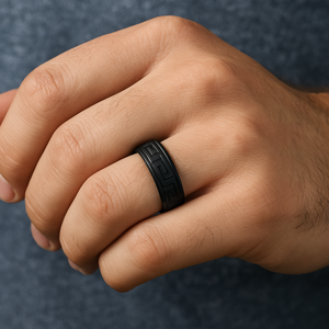 Black zirconium Greek key design stainless steel men's ring by T.M.J, featuring a bold band with intricate pattern.