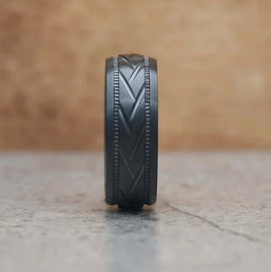 Black zirconium patterned stainless steel men's ring by T.M.J, featuring a sleek, modern design with intricate pattern details.
