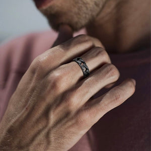 T.M.J Legion Antique Steel Curb Link Ring made of stainless steel, featuring a bold, textured curb link design.