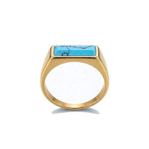 T.M.J stainless steel signet ring with gold plating and turquoise inlay, showcasing a stylish and bold design.