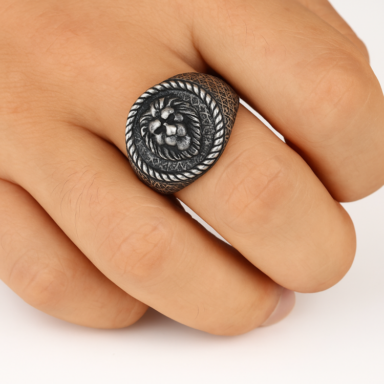 Silver men's stainless steel lion head ring with antique finish, featuring a bold lion emblem symbolizing strength and legacy.