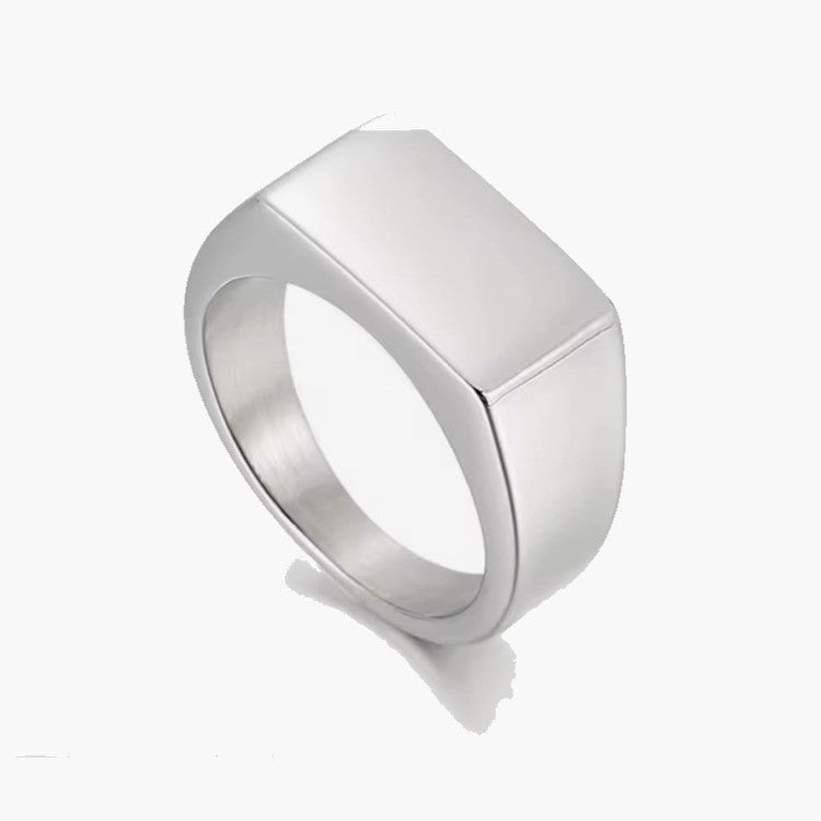 Men’s polished silver 316L stainless steel dress ring by T.M.J, featuring a sleek, shiny finish and modern design.