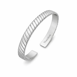 Sterling silver bangle by T.M.J with chevron design, brushed finish, gold-plated or rhodium-plated for elegant jewelry.