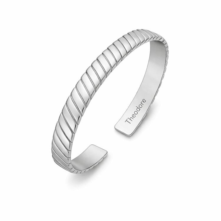 Sterling silver bangle by T.M.J with chevron design, brushed finish, gold-plated or rhodium-plated for elegant jewelry.