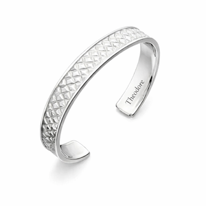 Sterling silver woven pattern cuff bangle bracelet by T.M.J, featuring intricate woven design on a sleek silver bracelet