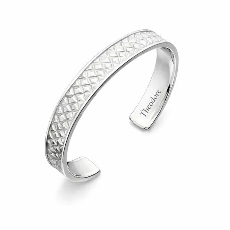 Sterling silver woven pattern cuff bangle bracelet by T.M.J, featuring intricate woven design on a sleek silver bracelet