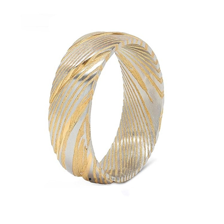 Polished gold Cerakote Damascus stainless steel ring by T.M.J, a sleek 8mm comfort-fit band.