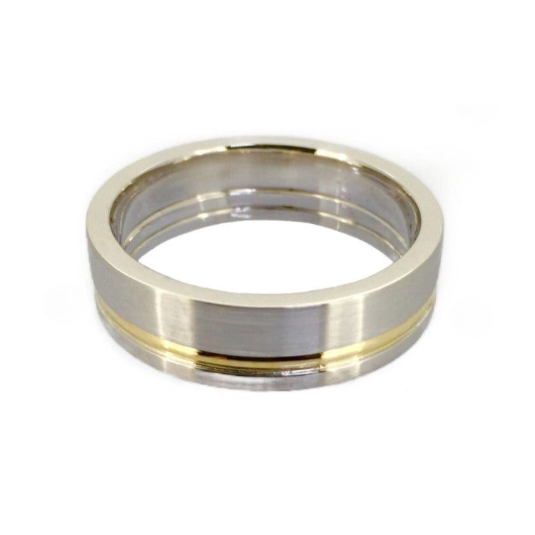 Titanium satin finish ring with gold inlay, 7mm wide, from T.M.J, showcasing sleek modern design and smooth surface.