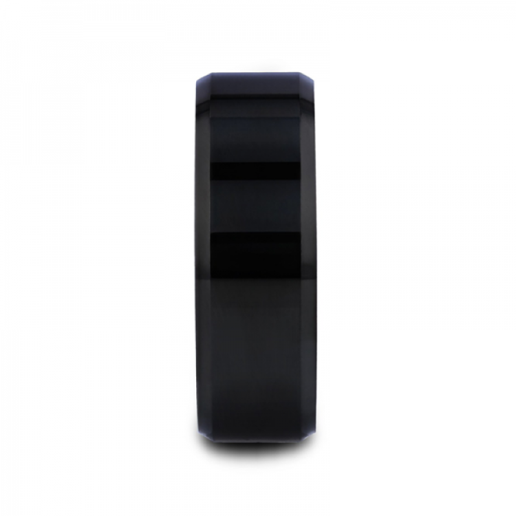 T.M.J "The Abyss" tungsten carbide ring with a sleek, dark finish and minimalist design, showcasing its smooth band and modern style.