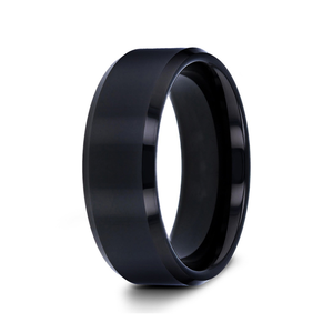 T.M.J Tungsten Rings The Abyss tungsten carbide ring with a sleek, dark finish and smooth band design.