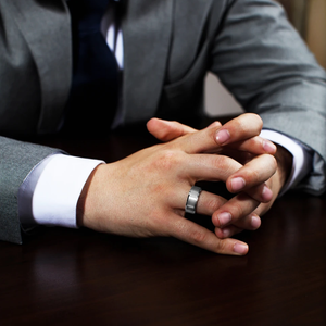T.M.J tungsten carbide ring called "The Silver Lining" with sleek silver finish, featuring a polished band and modern design.