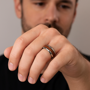 T.M.J tungsten carbide ring with oak wood inlay, beveled edges, 8mm width, showcasing a sleek, modern design for men's jewelry.