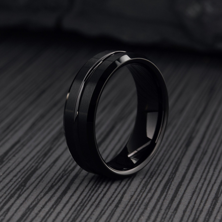 T.M.J Black Ember Tungsten Carbide Ring showing a sleek, dark finish and smooth band design for men's tungsten rings.