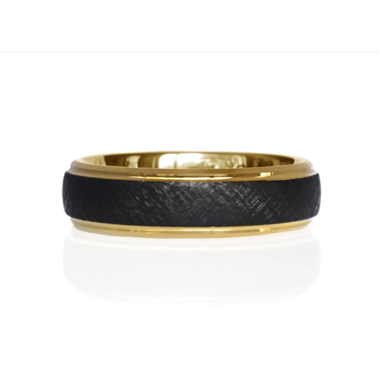 Black tungsten carbide ring with gold accent, 6mm width, from T.M.J, featuring a sleek, polished design.