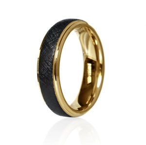 Black tungsten carbide ring with gold accent, 6mm width, from T.M.J, featuring a sleek, polished band with subtle gold detailing.